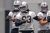 Raiders defensive tackle Gerald McCoy (93) stretches during team practice at the Raiders Headqu ...
