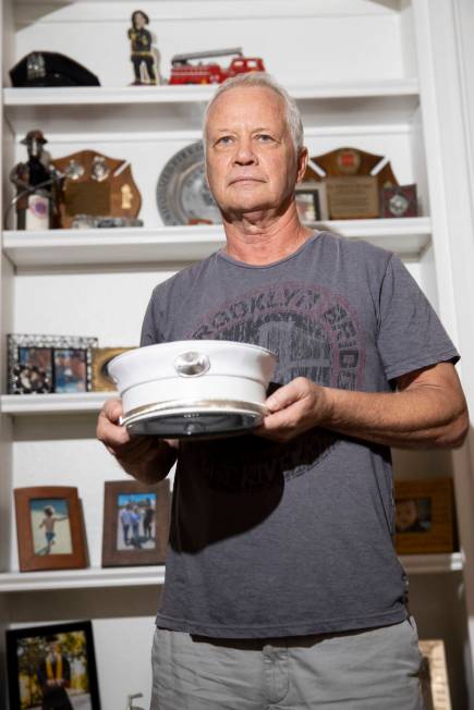Ed Bergen, a retired New York City firefighter, poses for a portrait at his home in Las Vegas, ...