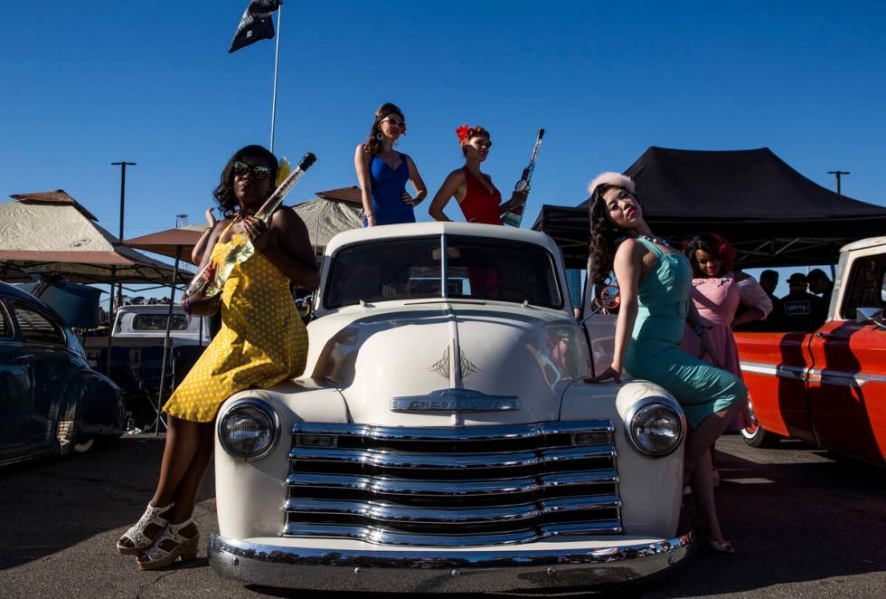 Women dressed in pin up attire, from left, Maria Bryant, Cherri Forever, Roxi Rocket, Sugar Moo ...