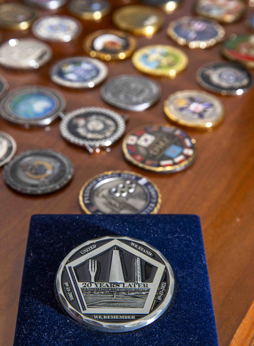 A special 9/11 coin marking the 20th anniversary of the terrorist attacks as seen in the office ...