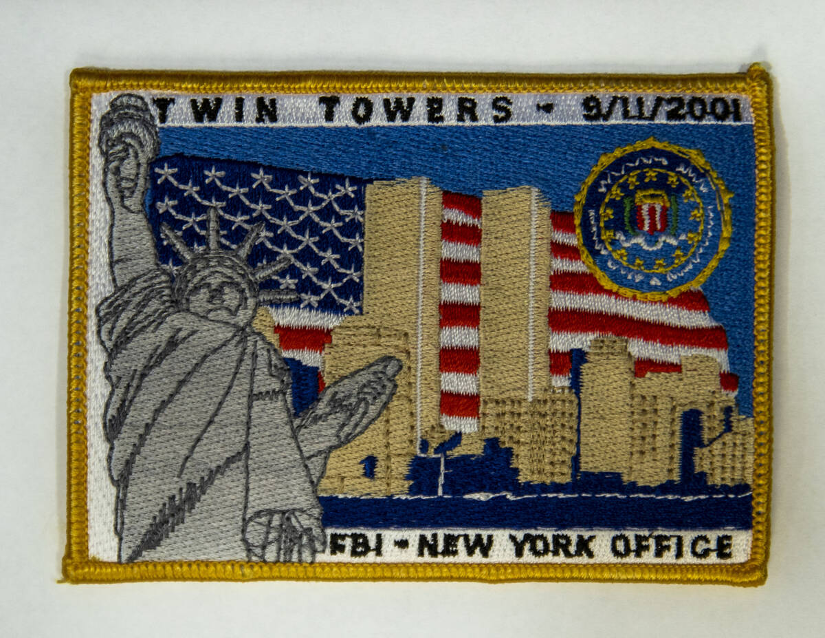 A memorial patch given to FBI Special Agent Tracy Dockery while working to sort 9/11 debris fro ...