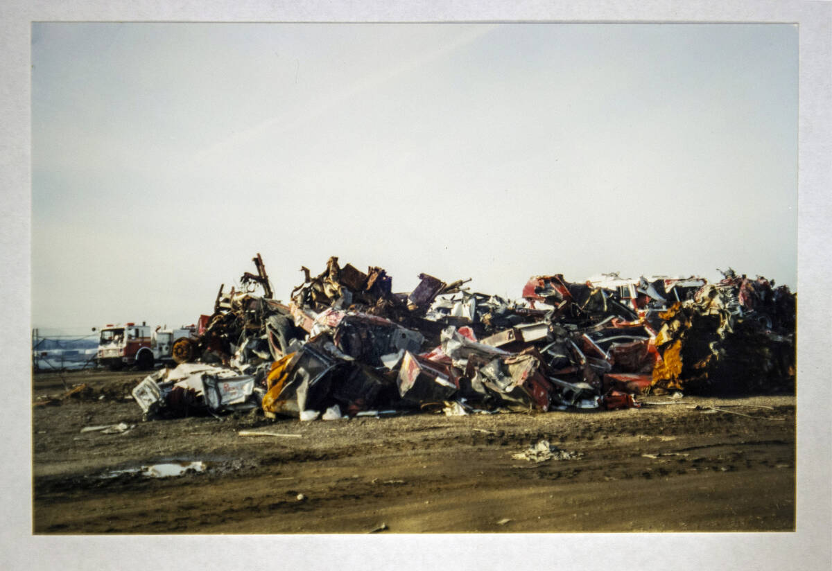 A stack of damaged cars and other metal taken by FBI Special Agent Tracy Dockery while working ...