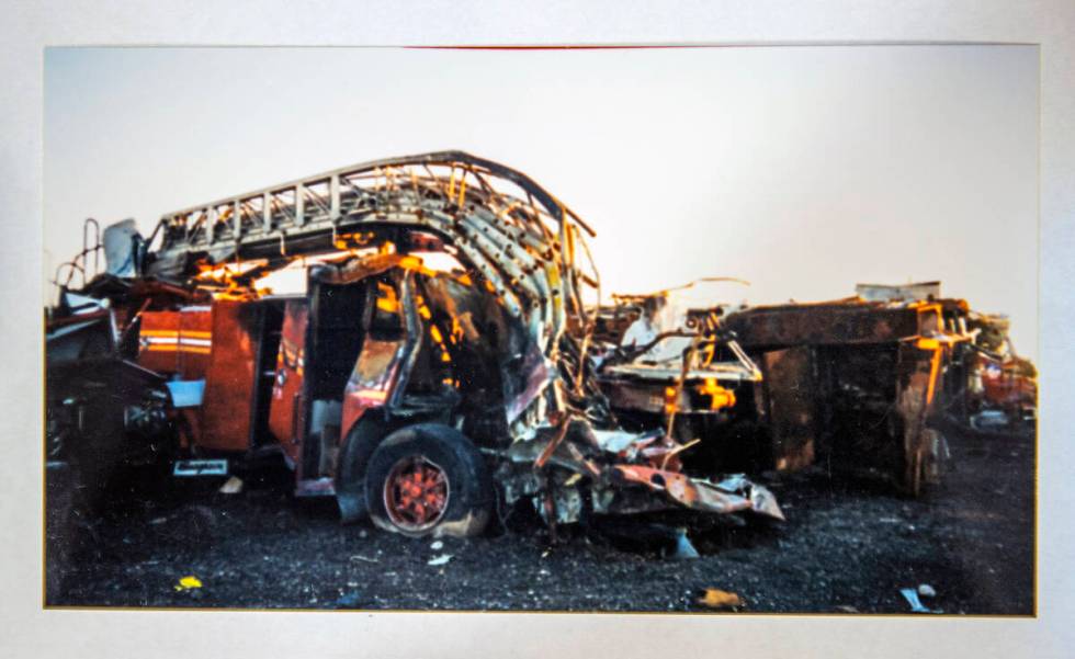 A mangled firetruck in an image taken by FBI Special Agent Tracy Dockery while working to sort ...
