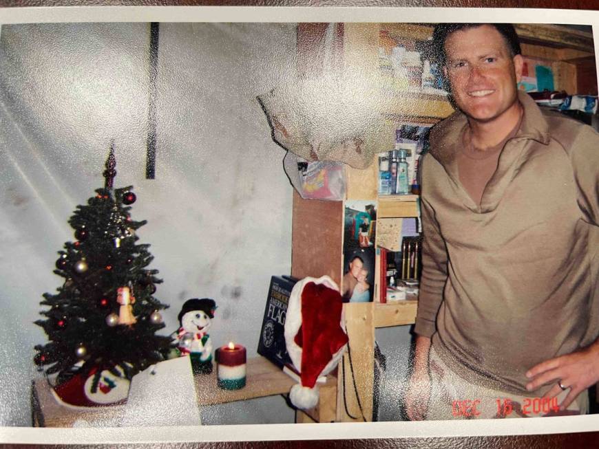 Jeb Bozarth, now a Henderson police sergeant, is pictured in Iraq during the holidays while on ...