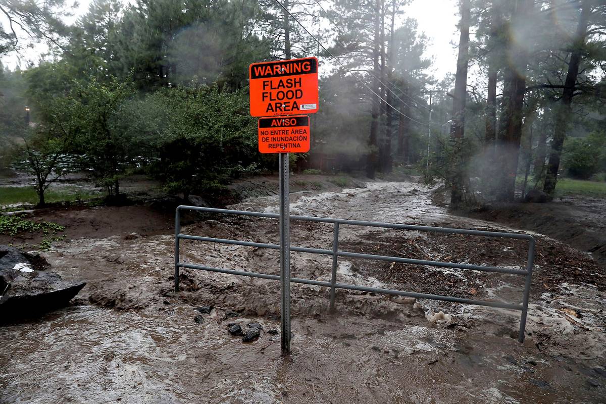 Paradise Wash floods Tuesday, Aug. 17, 2021 in Flagstaff, Ariz. (Jake Bacon/Arizona Daily Sun v ...