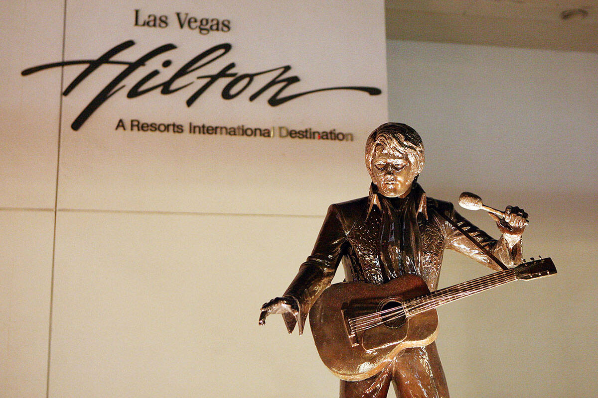 A statue of Elvis is shown outside the main entrance to the Las Vegas Hilton hotel-casino Frida ...