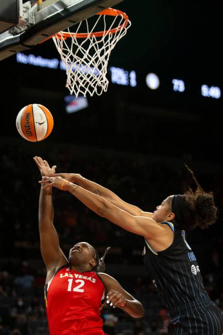 Chicago Sky forward/center Candace Parker (3) knocks down an attempted layup by Las Vegas Aces ...