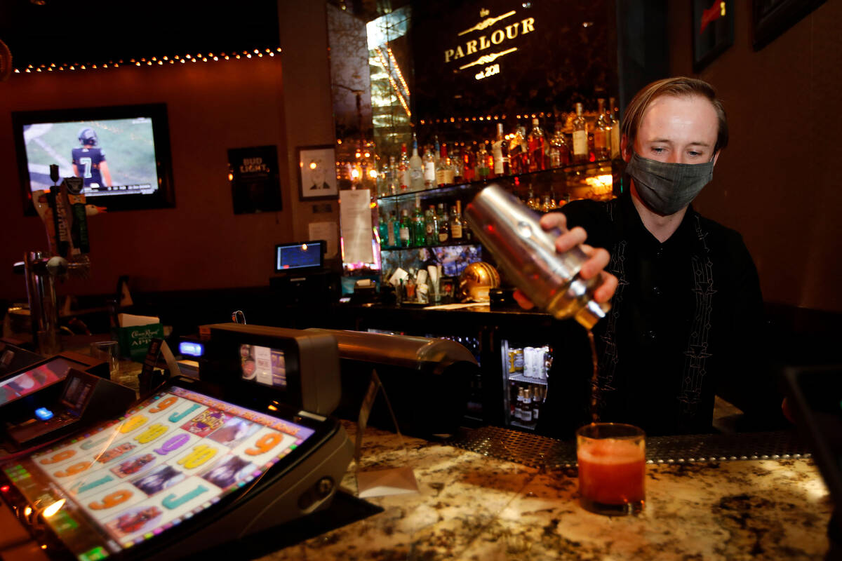 Bartender Alex Siple makes a drink in The Parlour at El Cortez in Las Vegas, Saturday, Sept. 4, ...