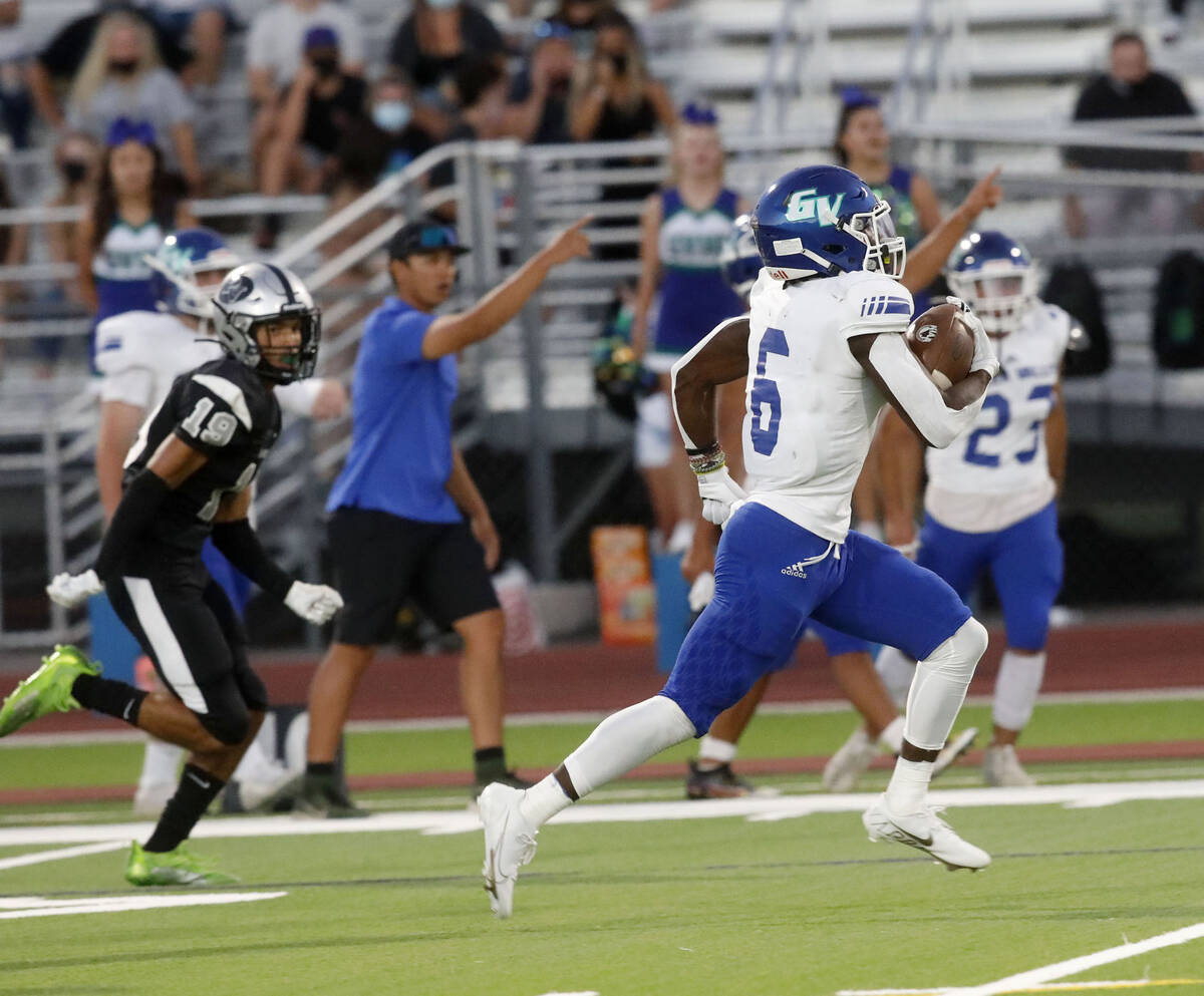 Green Valley High School's Jaylen Mcknight (6) runs into the end zone for a touchdown during th ...