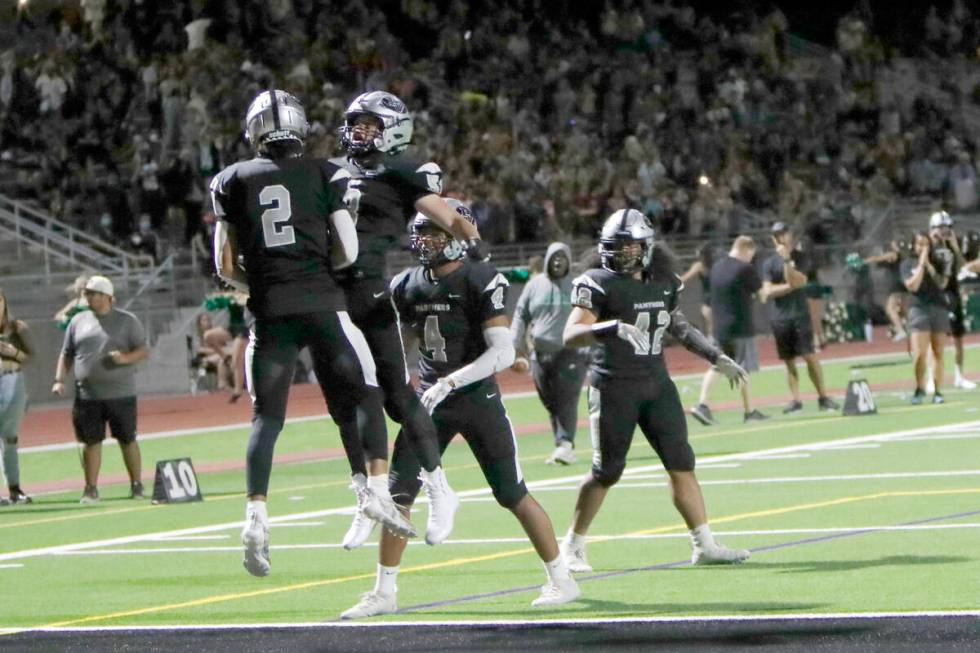 Palo Verde High School's Paisley Nickelson (2) celebrates his touchdown with his teammates Dust ...