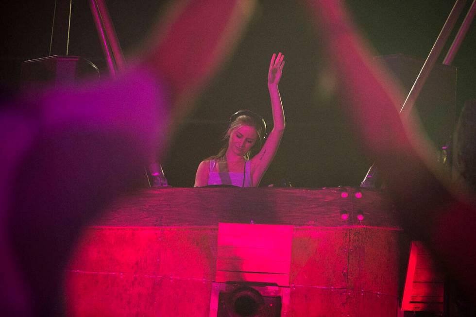 DJ Pauline Herr dances during her set at the Lost in Dreams music festival at the Downtown Las ...