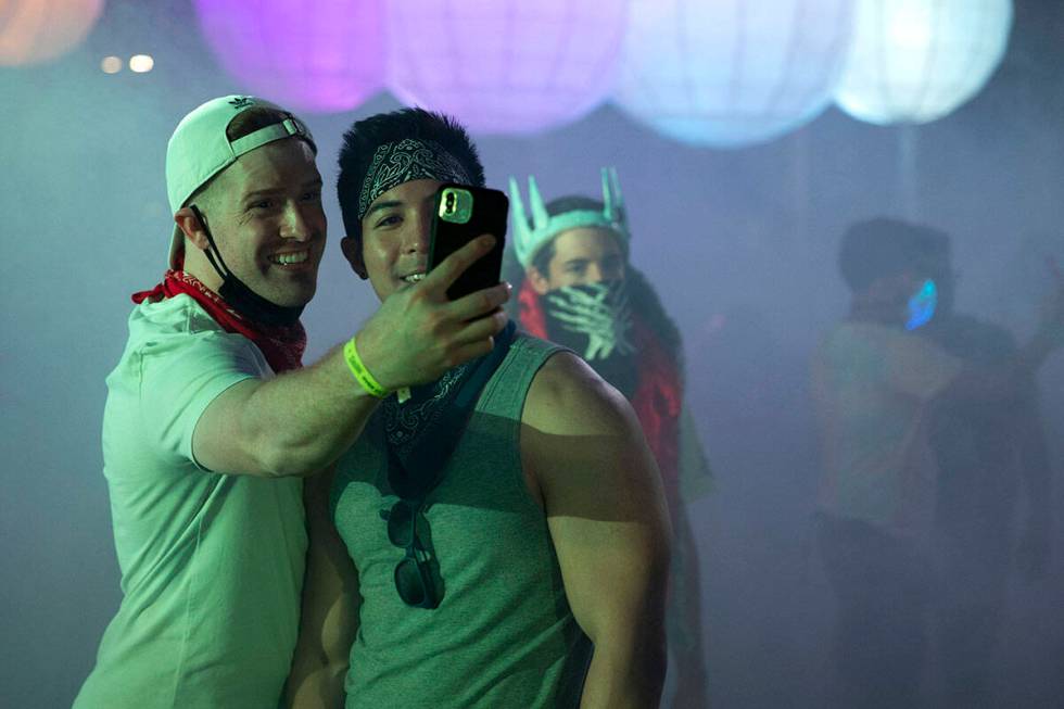 Jake Updegrove, left, and Mikel Delion, of Los Angeles, Calif., take a photo during the Lost in ...