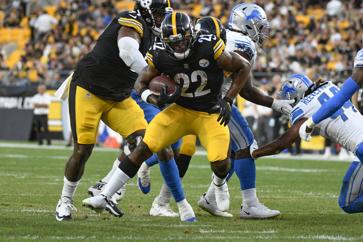 In this Aug. 21, 2021, file photo, Pittsburgh Steelers running back Najee Harris (22) runs agai ...