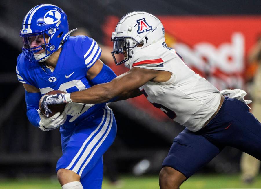 Brigham Young Cougars defensive back Hayden Livingston (28) pulls in an interception over Arizo ...