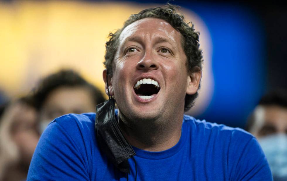 BYU fans cheer for the Cougars in the first quarter during a college football game against the ...