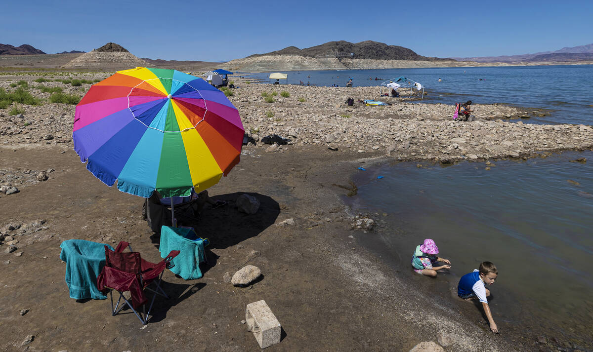 Trevor, 5, and Haley, 4, Ball play in Lake Mead on Labor Day on Monday, Sept. 6, 2021, near Bou ...
