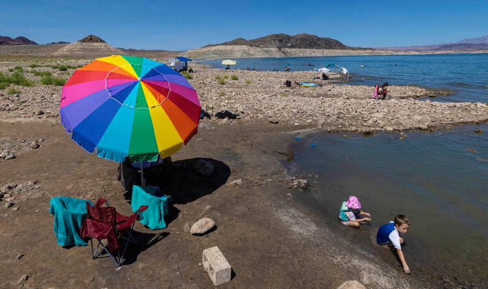 Trevor, 5, and Haley, 4, Ball play in Lake Mead on Labor Day on Monday, Sept. 6, 2021, near Bou ...