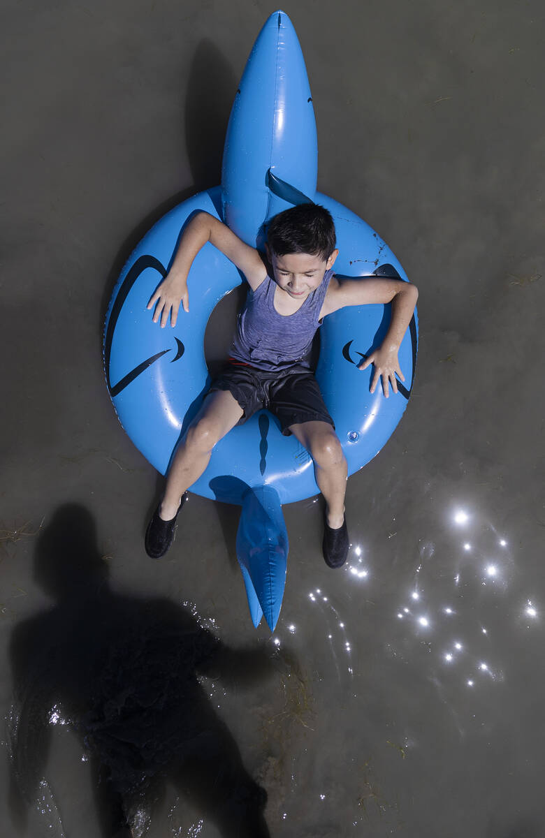 Mason Soto, 6, enjoys playing in Lake Mead on Labor Day on Monday, Sept. 6, 2021, near Boulder ...