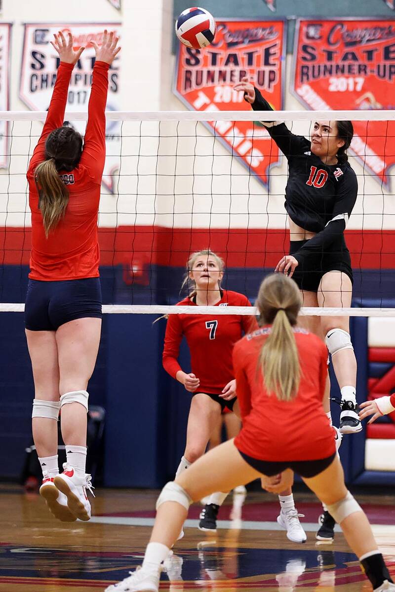 Liberty's Sophia Ortquist (10) spikes the ball against Coronado in a girls volleyball game at C ...
