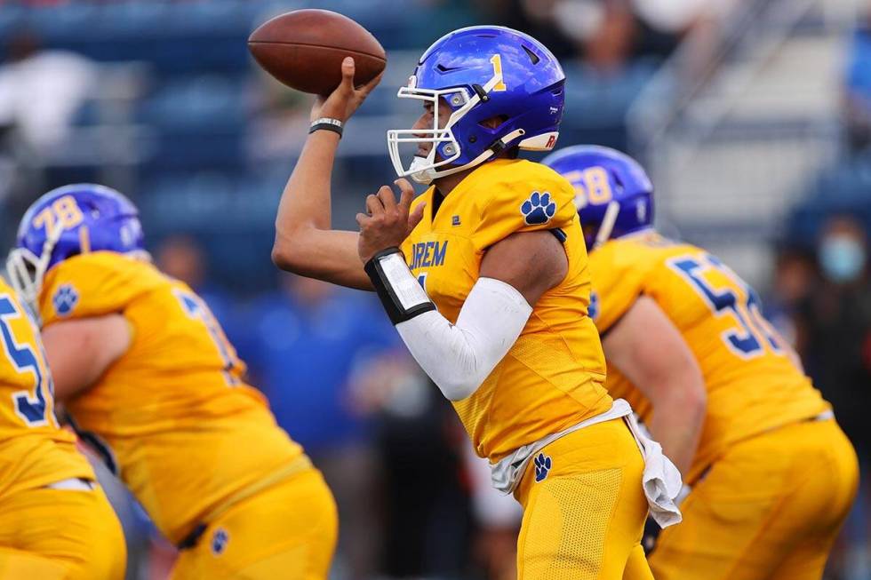 Orem's Chase Tuatagaloa (1) throws a pass against Desert Pines in the second quarter of a footb ...