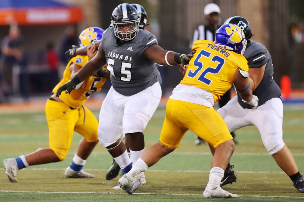 Desert Pines' BJ Brooks (55) protects the quarterback in the fourth quarter of a football game ...