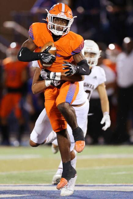 Bishop Gorman's Zachariah Branch (1) makes a catch in the second quarter of a football game aga ...