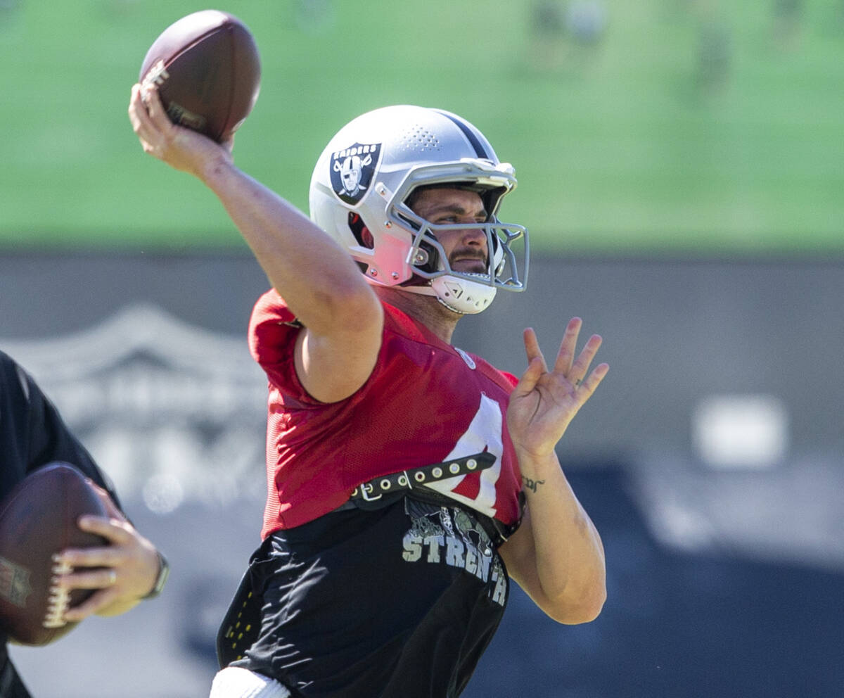 Raiders quarterback Derek Carr (4) throws the football during team practice at the Raiders Head ...