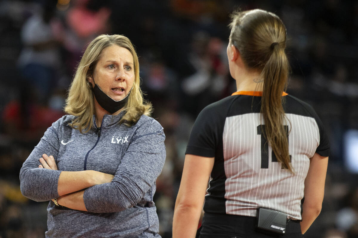 Minnesota Lynx head coach Cheryl Reeve has a disagreement with a referee during the first half ...