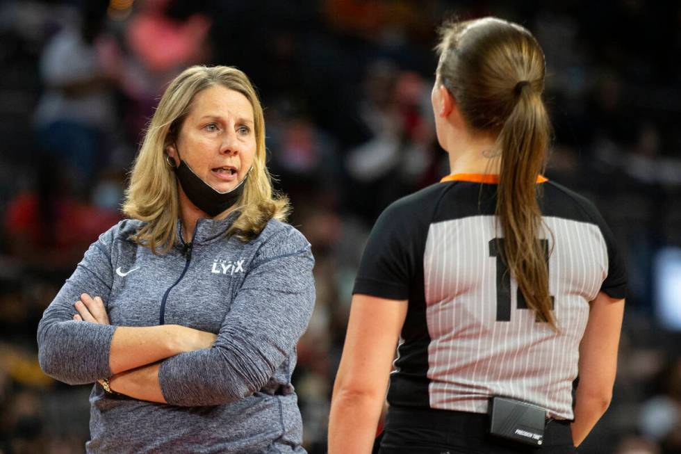 Minnesota Lynx head coach Cheryl Reeve has a disagreement with a referee during the first half ...