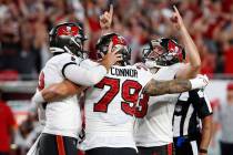 Tampa Bay Buccaneers' Ryan Succop (3) celebrates with Pat O'Connor (79) and Bradley Pinion (8) ...