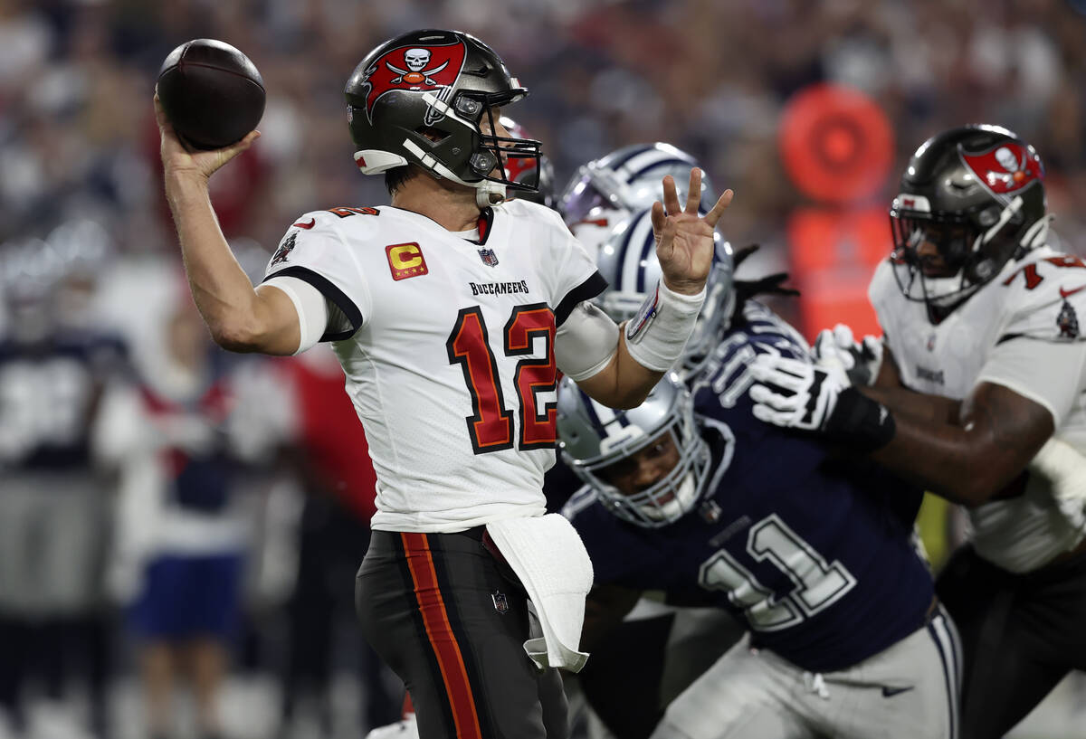 Tampa Bay Buccaneers quarterback Tom Brady (12) throws a pass against the Dallas Cowboys during ...