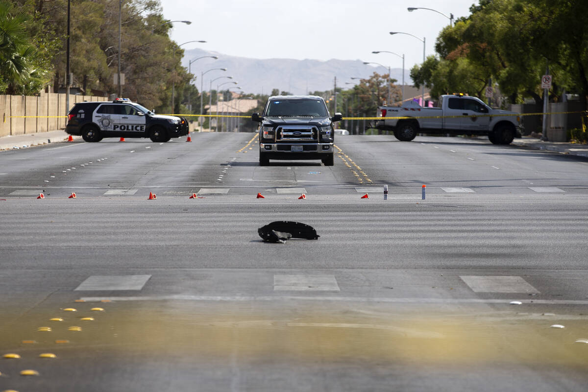 Las Vegas police respond to the scene of a fatal car accident at the intersection of West Flami ...