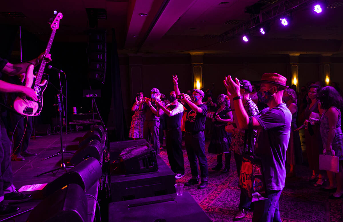 Attendees cheer as Las Vegas band Shanda & the Howlers perform during the first day of Viva ...