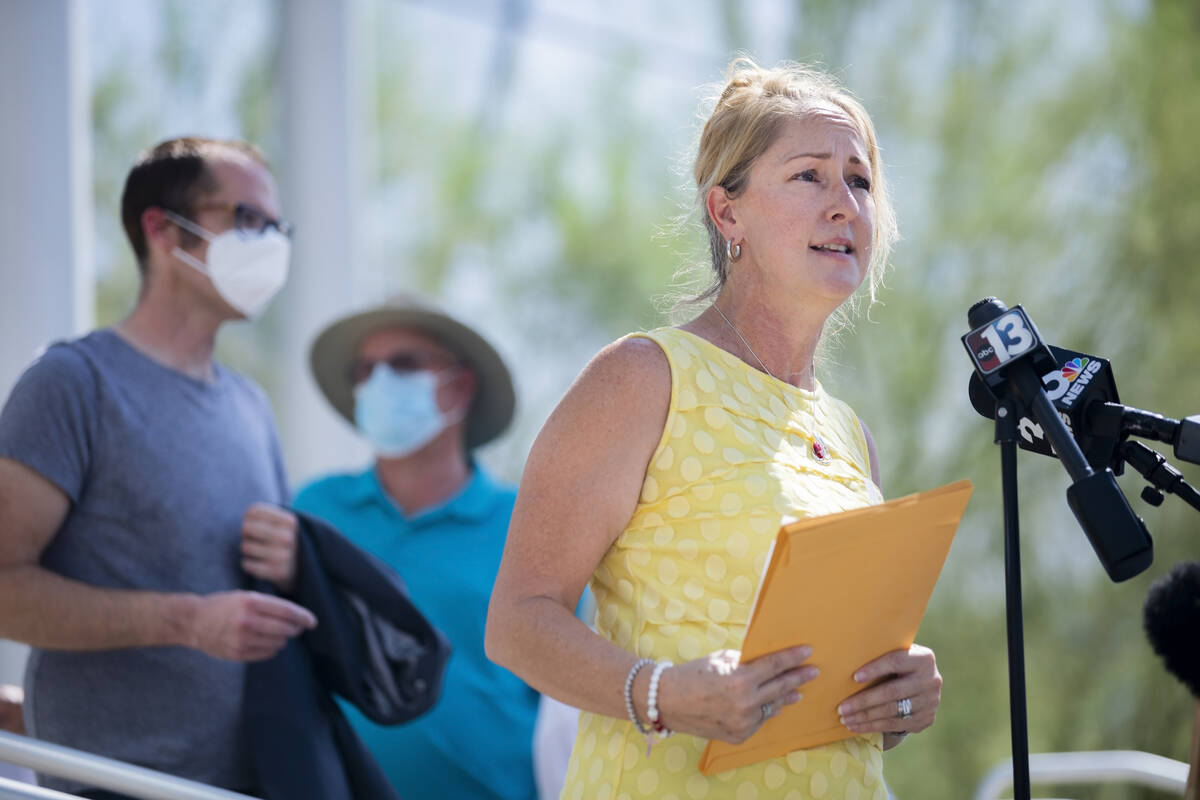 Molly Taylor, organizer of the "Expel Michele" recall effort, speaks during a news conference o ...