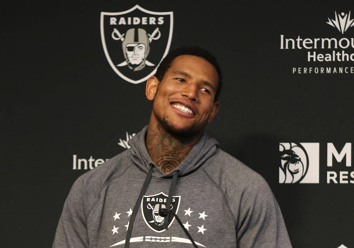 Raiders tight end Darren Waller (83) reacts during a news conference at the Raiders Headquarter ...