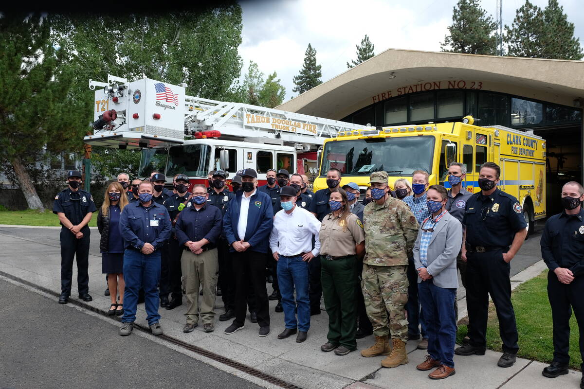 Gov. Steve Sisolak posed for a group photo with firefighters from Clark County who traveled to ...