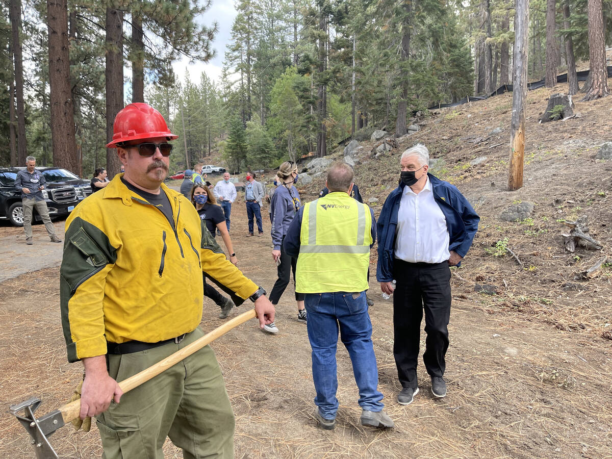 Gov. Steve Sisolak and other officials toured areas near Lake Tahoe where crews cleared vegetat ...