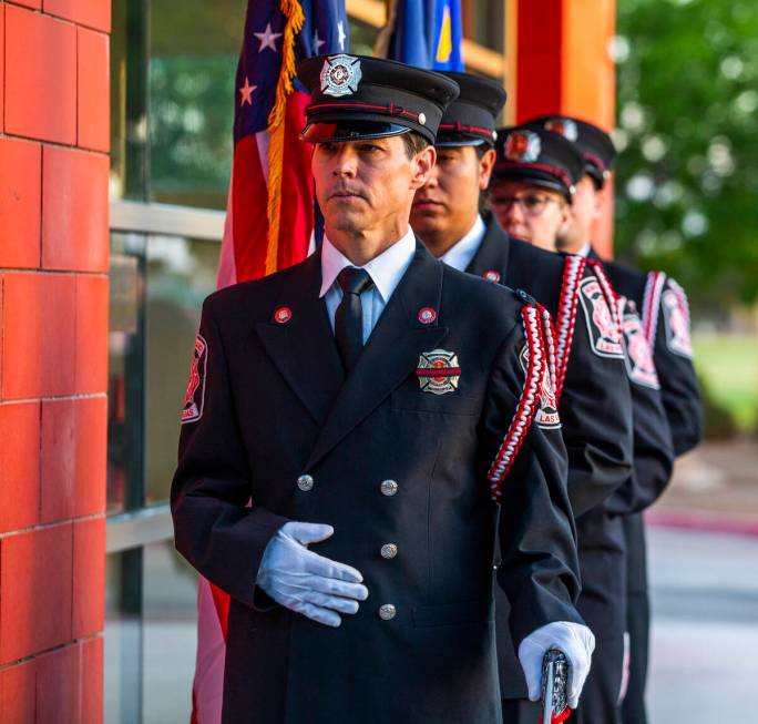 The Las Vegas Fire Department honor guard stand in formation Saturday, Sept. 11, 2021, at Fire ...