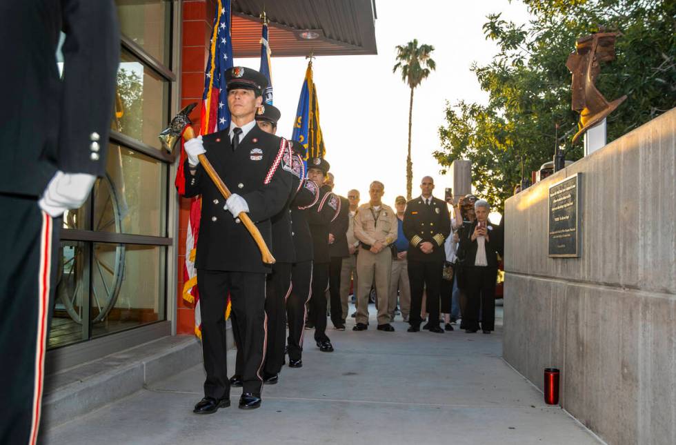 The Las Vegas Fire Department honor guard march in, Saturday, Sept. 11, 2021, at Fire Station F ...