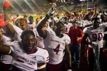 Jacksonville State players celebrate after a 20-17 win in an NCAA college football game against ...
