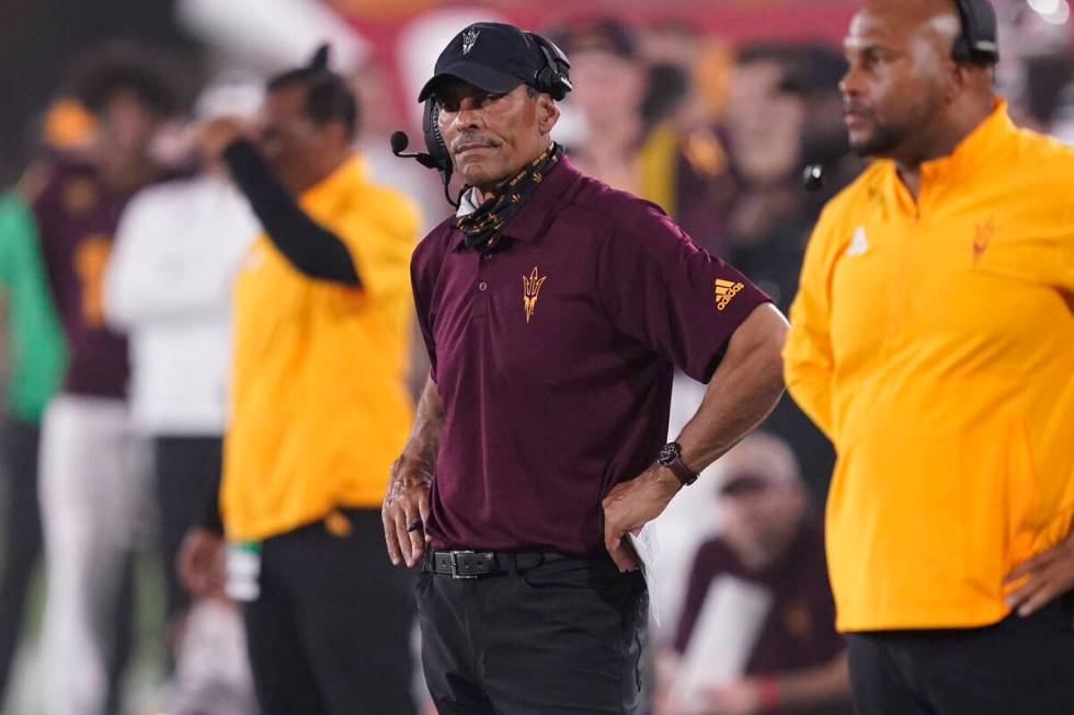 Arizona State head coach Herm Edwards watches his team during the first half of an NCAA college ...