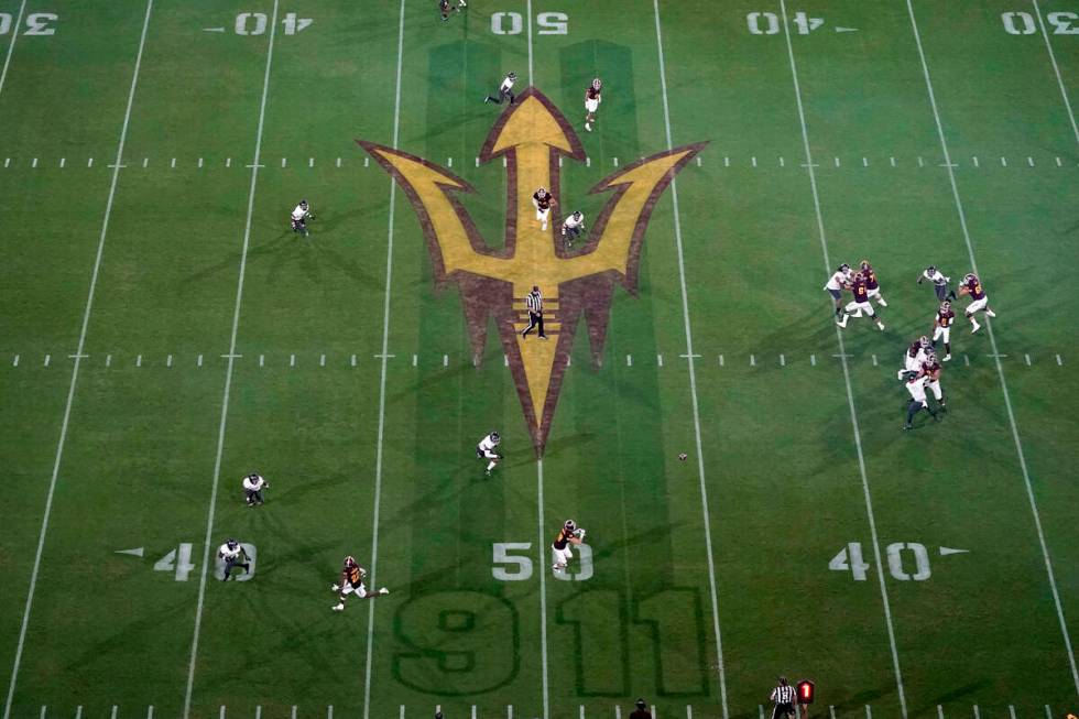 A Sept. 11 memorial is shown on the field during the first half of an NCAA college football gam ...