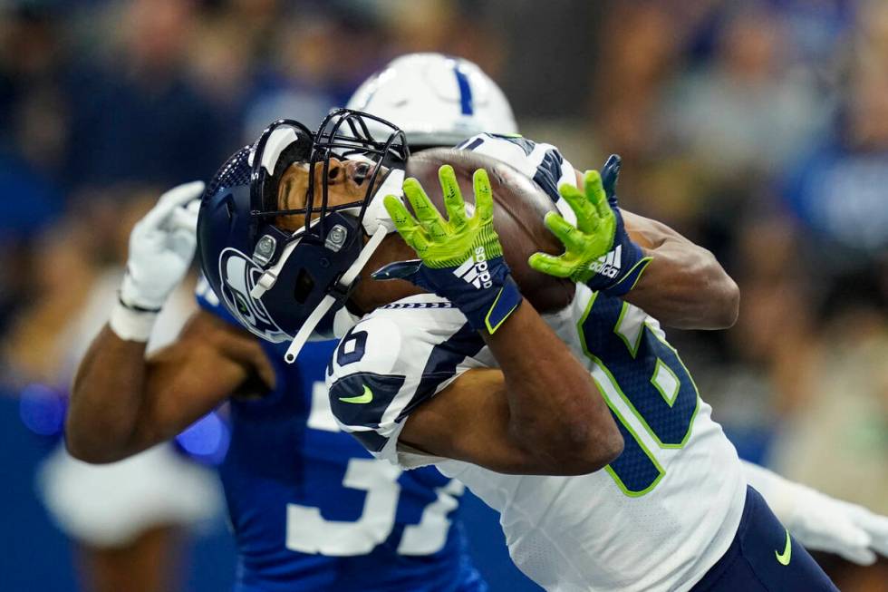 Seattle Seahawks wide receiver Tyler Lockett (16) makes catch for a touchdown in front of India ...