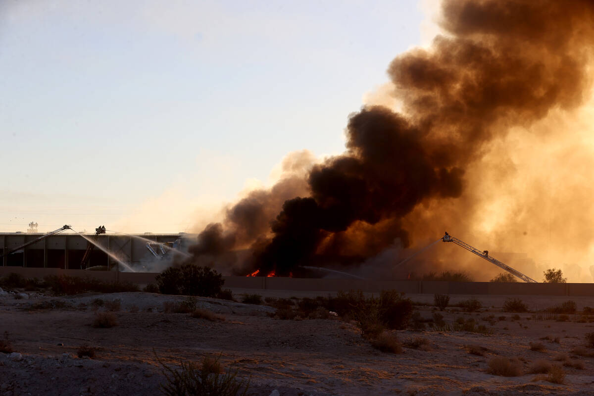 The North Las Vegas Fire Department battles a fire at a Republic Services recycling facility Mo ...