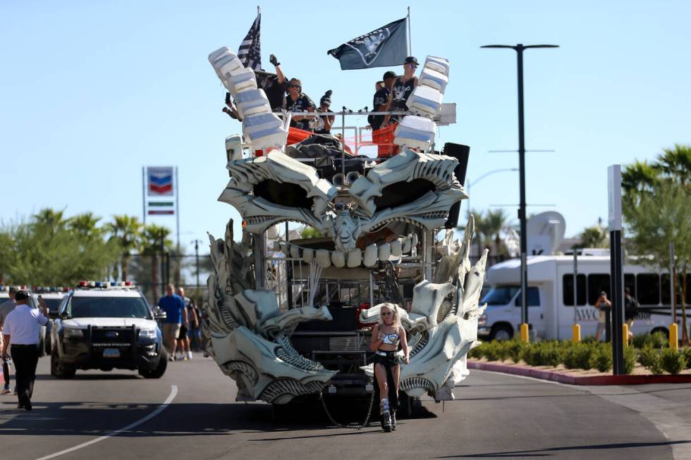 An art car arrives to Allegiant Stadium before the start of an NFL football game between the Ra ...