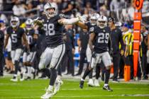 Raiders defensive end Maxx Crosby (98) celebrates a defensive stoppage during the third quarter ...
