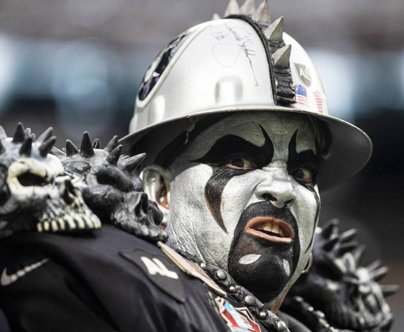 Raiders fans cheer for Las Vegas during an NFL football game against the Baltimore Ravens at Al ...