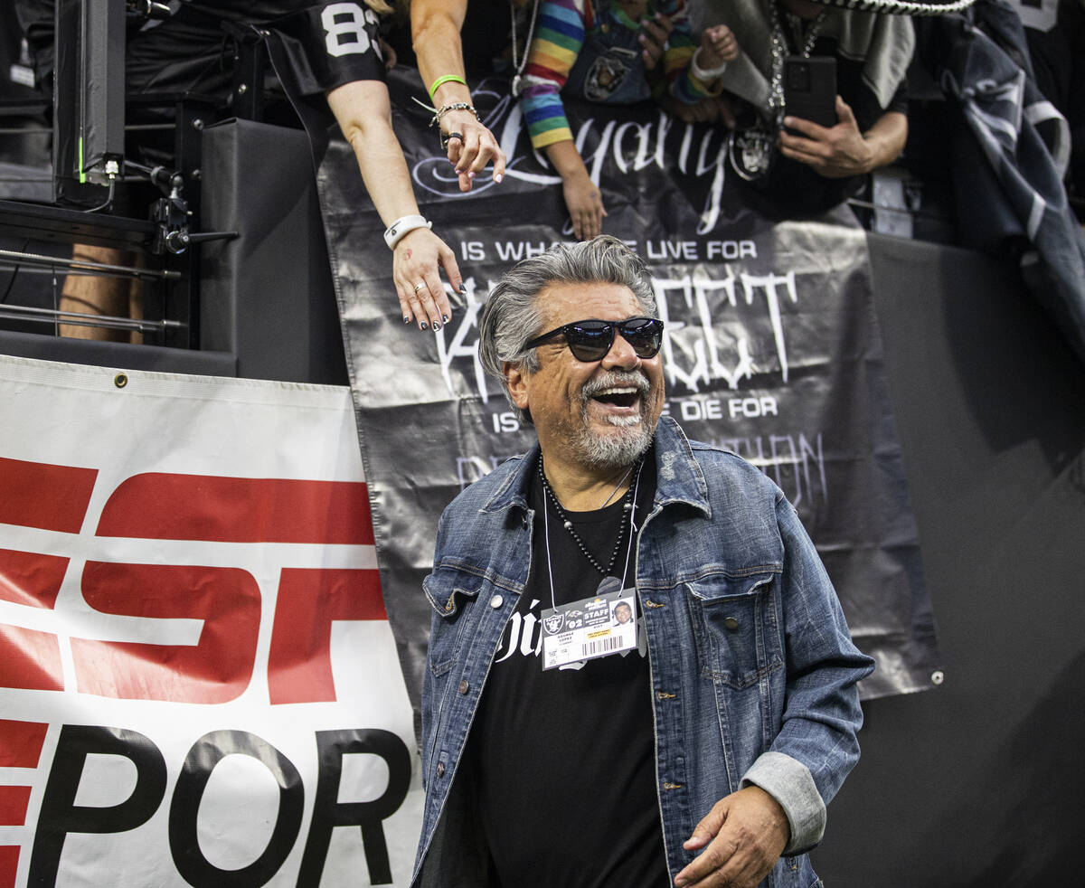 Raiders fan and celebrity comedian George Lopez cheers for Las Vegas during an NFL football gam ...