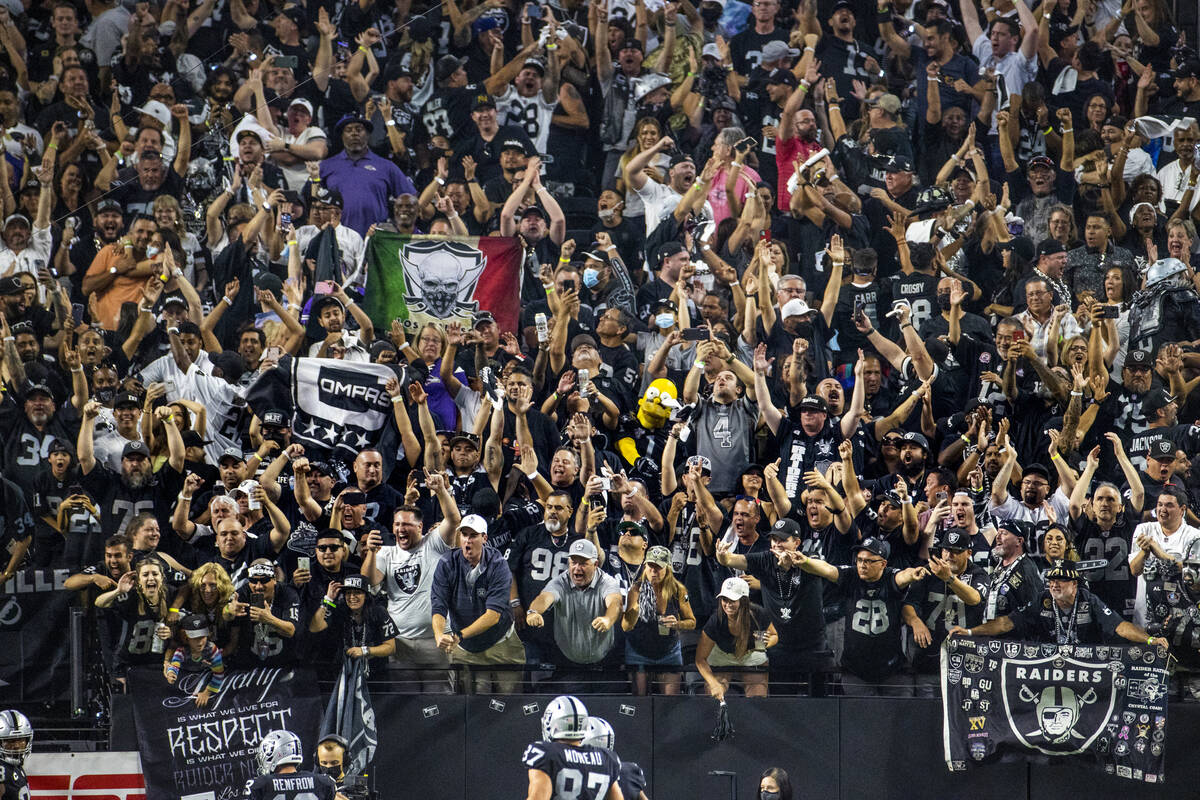 Raiders fans celebrate another score over the Baltimore Ravens during the fourth quarter of the ...
