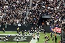 Fans cheer as the Raiders take the field to host the Baltimore Ravens on ÒMonday Night Footbal ...
